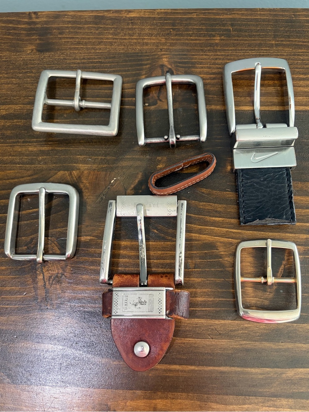 Lot of 6 Assorted Metal Belt Buckles with Leather Accent. One is Solid Brass.